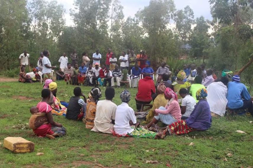 Church leaders and community members participating in an OGF activity